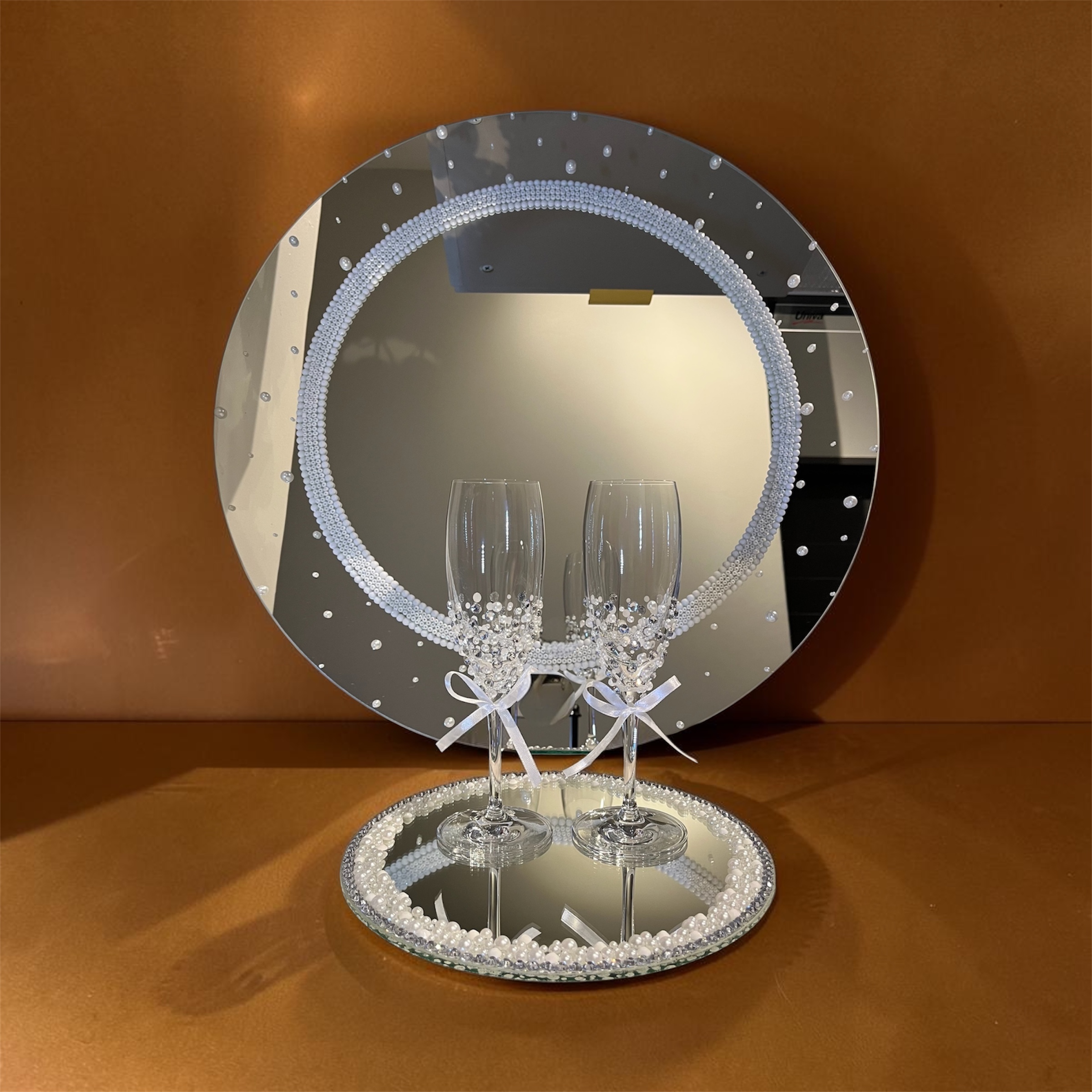 Handcrafted Jo.Sa Interiors statement mirror displayed in an elegant interior