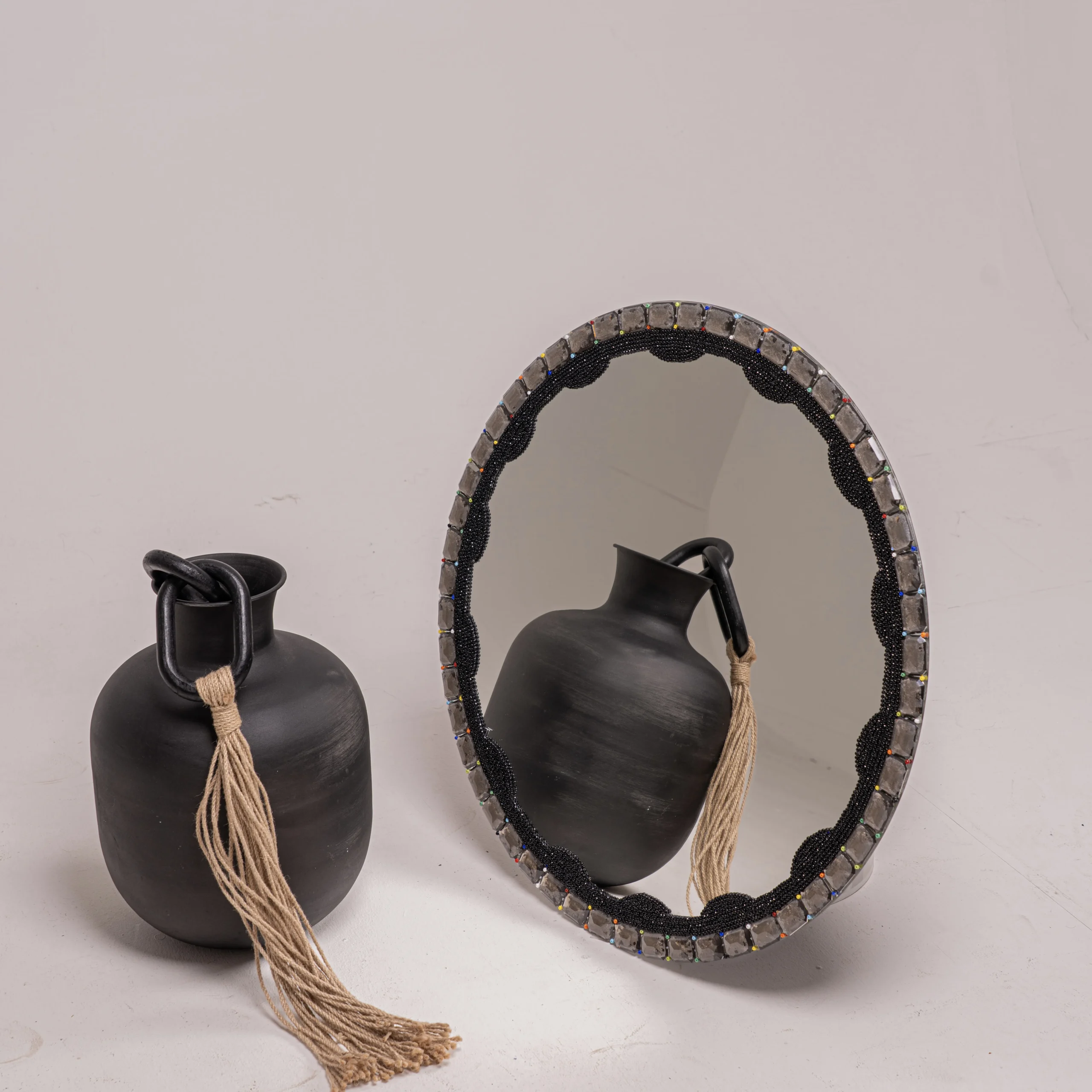 Decorative detailing on a handcrafted Jo.Sa Interiors mirror